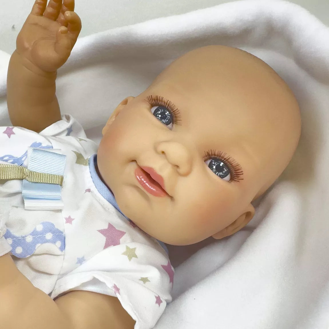 Nines d’Onil Baby Boy Doll Full Vinyl Bodied in Carrycot